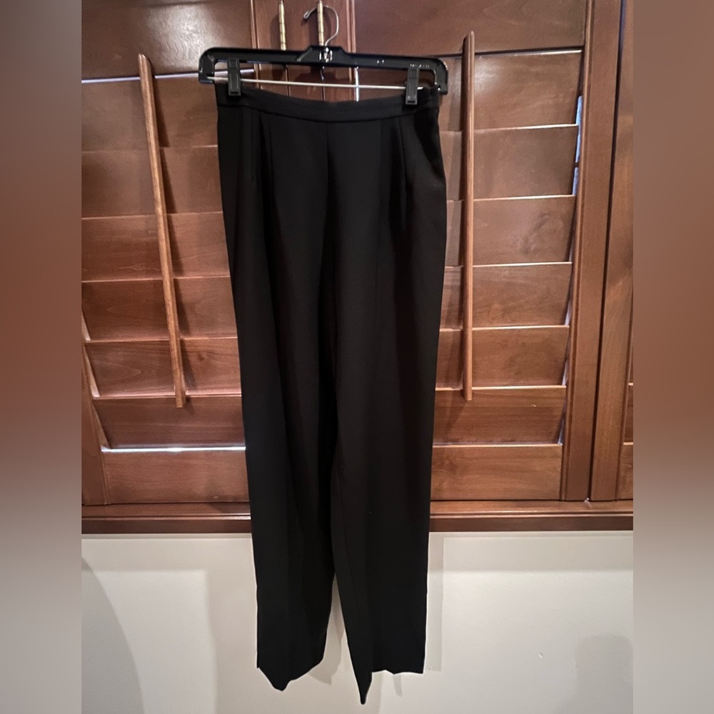 Two Moschino Slim Cigarette Pants. 100 % Wool. Side Zipper With Covered Button.